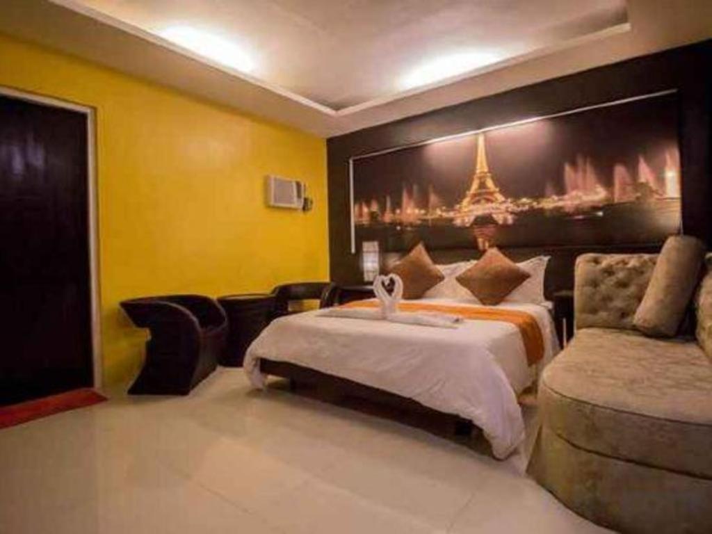 The Red Palm Suites And Restaurant Butuan City Exterior photo