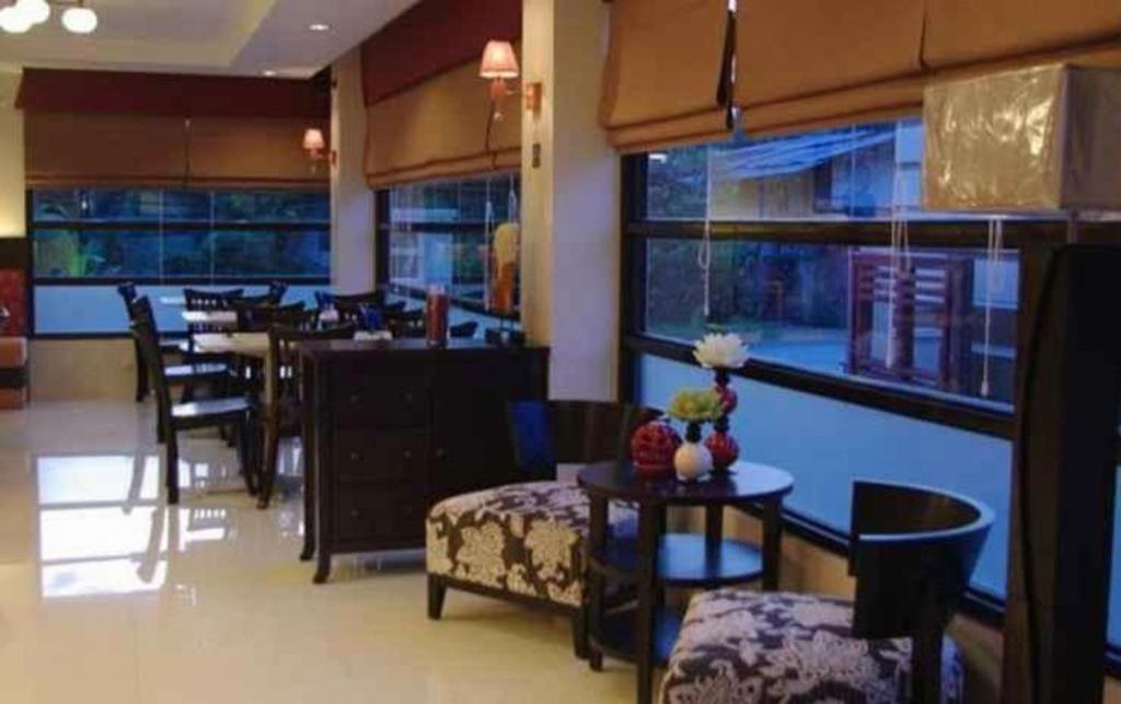 The Red Palm Suites And Restaurant Butuan City Exterior photo