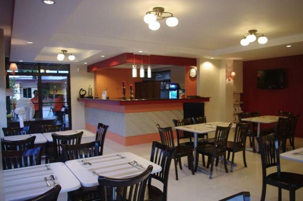 The Red Palm Suites And Restaurant Butuan City Exterior photo