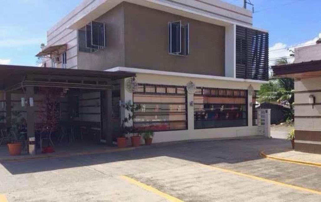 The Red Palm Suites And Restaurant Butuan City Exterior photo